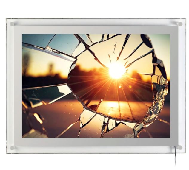 100247 med ramme i sølv